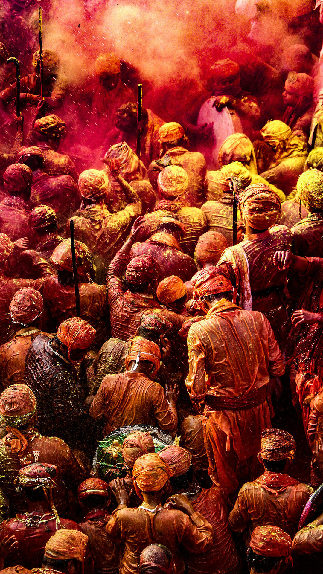 peaople celebrating traaditional colourfull holi with colours and water