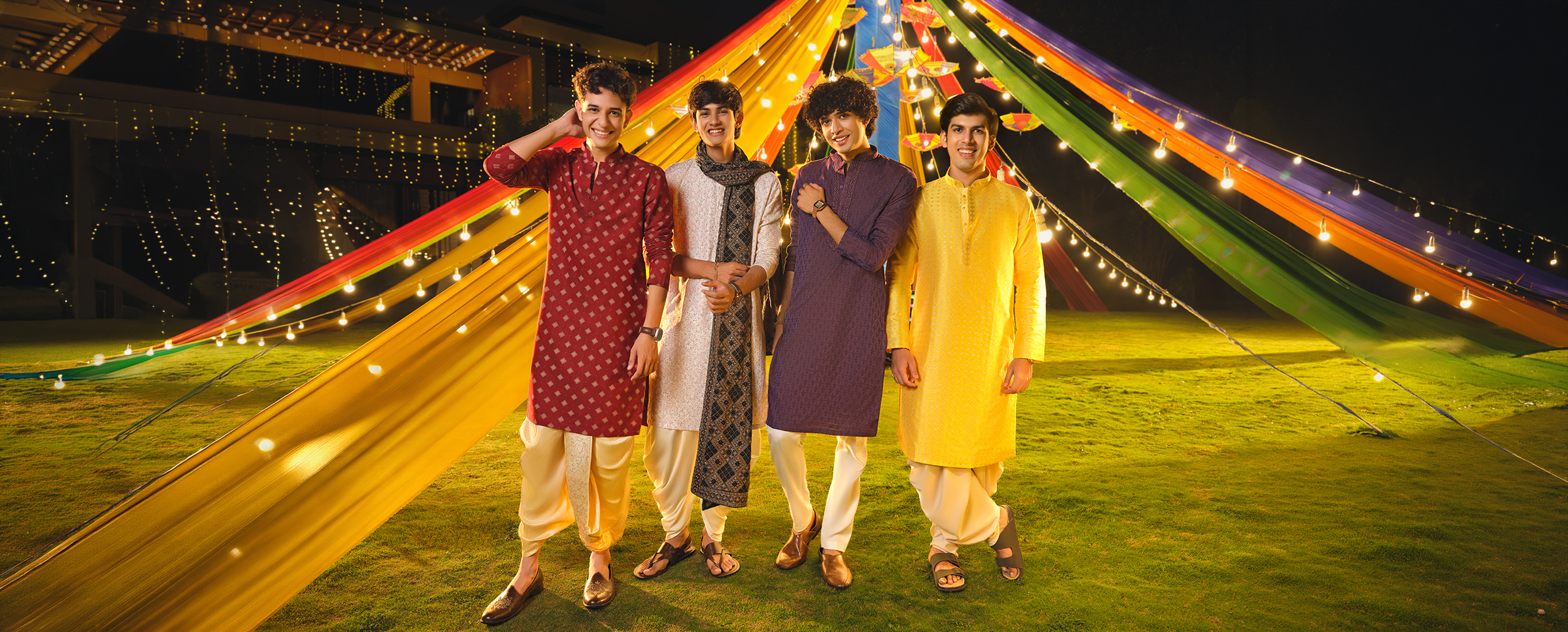 Diwas 2026 kurta trends collection featuring four men in festive ethnic wear, including red, ivory, purple, and yellow kurtas paired with traditional dhotis and churidars.