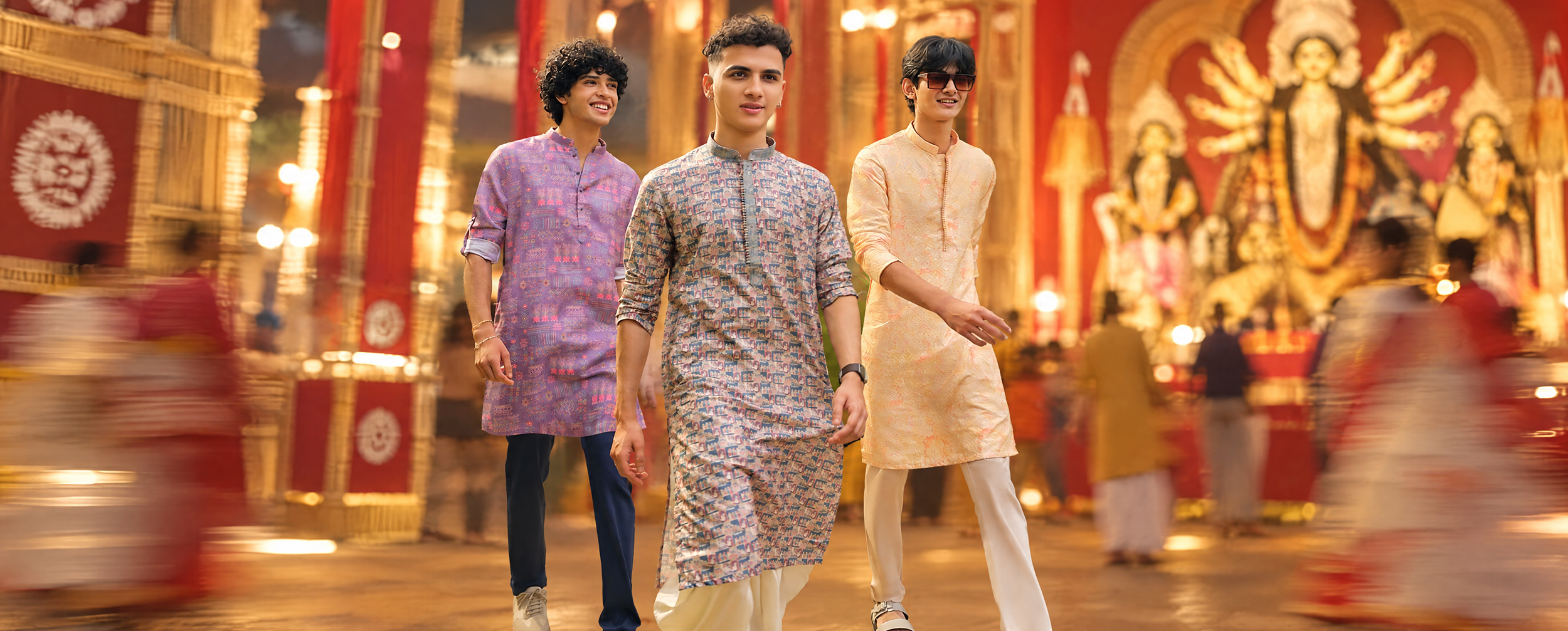 Men in festive ethnic outfits for pandal hopping during Durga Puja