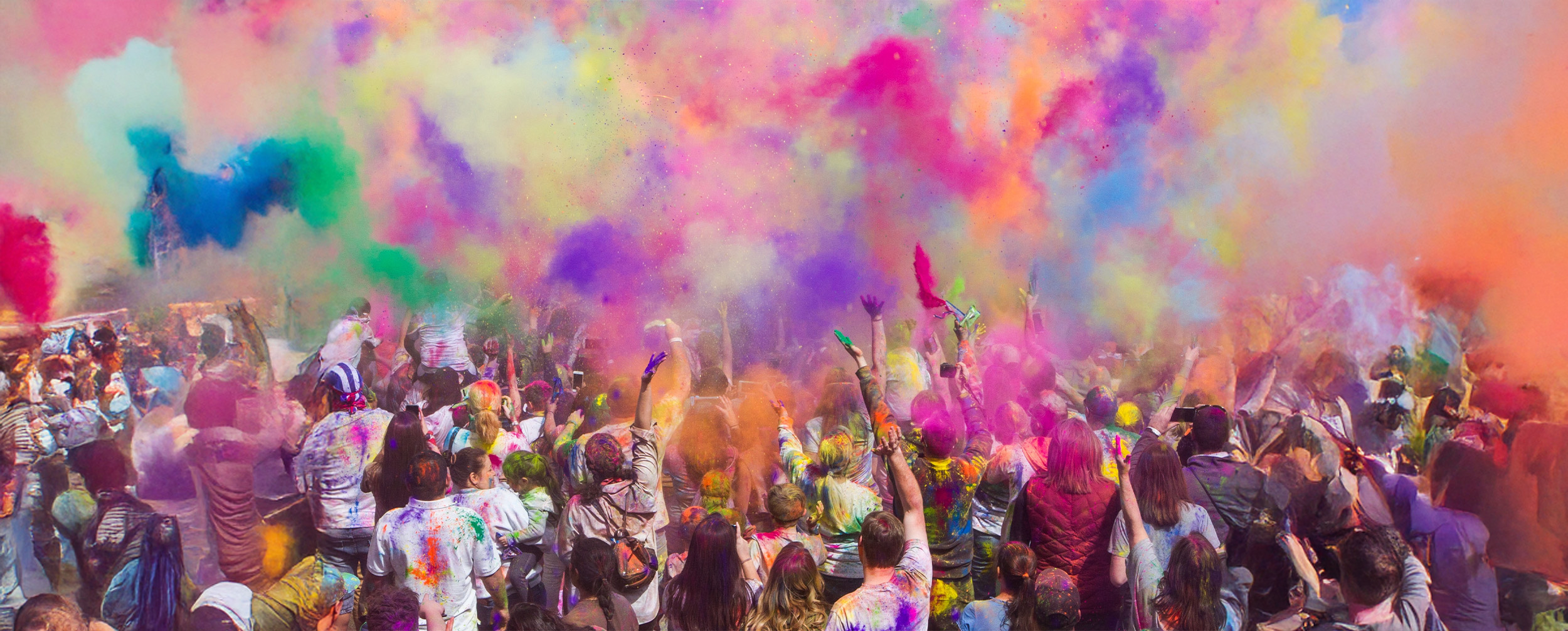 A beautifull frame in which peaople enjoying, dancing and celebrating holi with throwing colour in air A beautifull frame in which peaople enjoying, dancing and celebrating holi with throwing colour in air