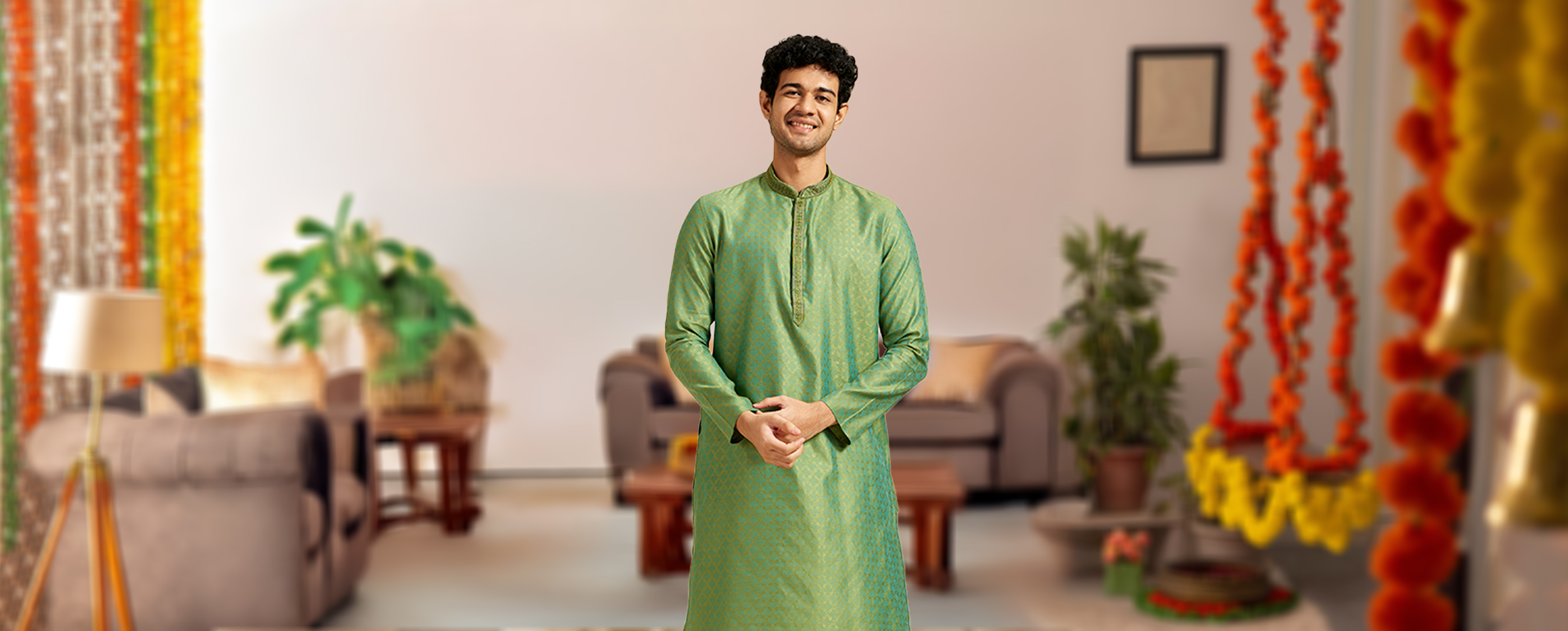 A man wearing traditional green kurta for pongal celebration A man wearing traditional green kurta for pongal celebration