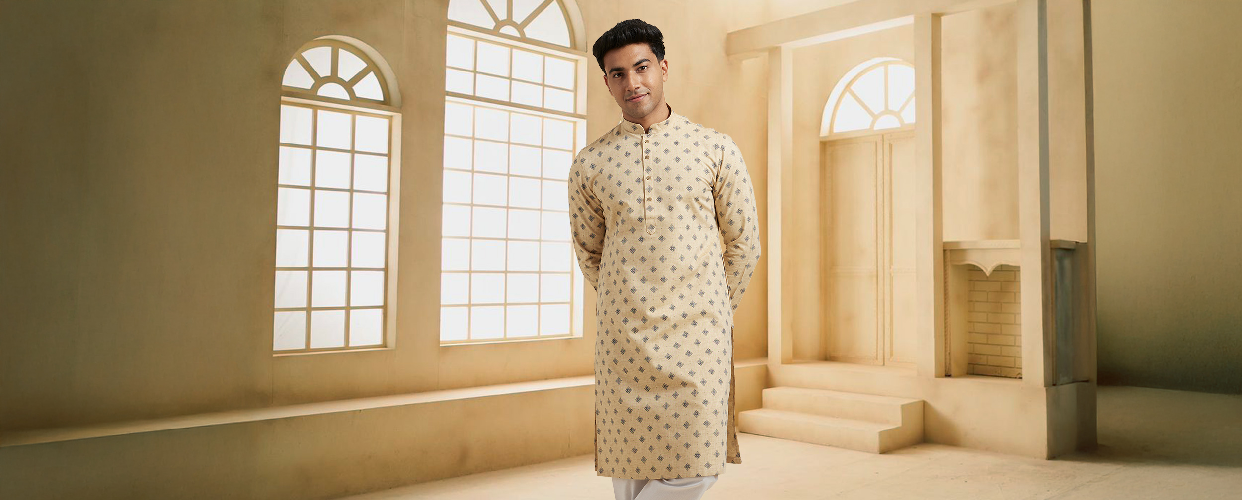 Groom wearing a beige embroidered kurta with white churidar, styled elegantly for weddings and festive occasions. Groom wearing a beige embroidered kurta with white churidar, styled elegantly for weddings and festive occasions.